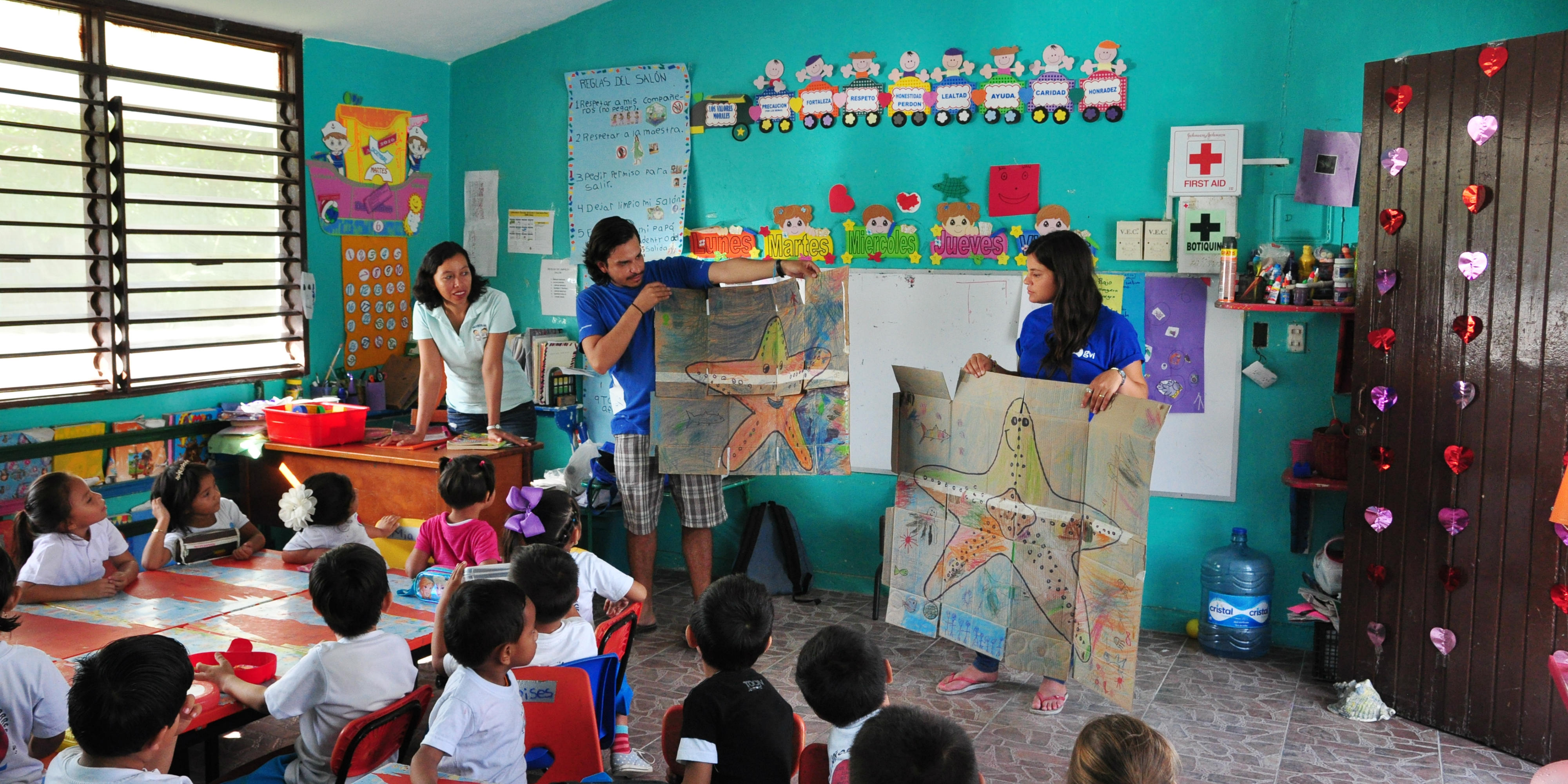 GVI participants teach the children about the ocean animals. 