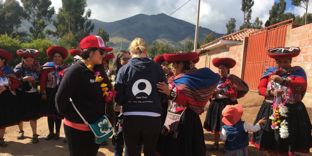 GVI staff engage with quechua people while working on locally-led sustainable development projects in Peru. 