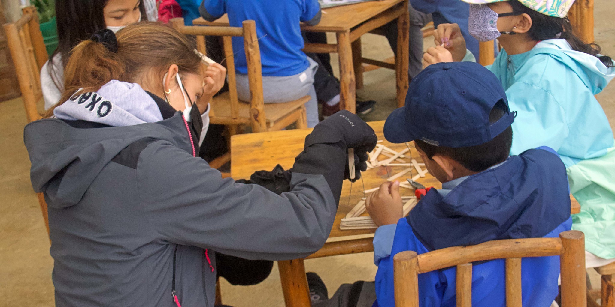 teaching kids at school in Peru