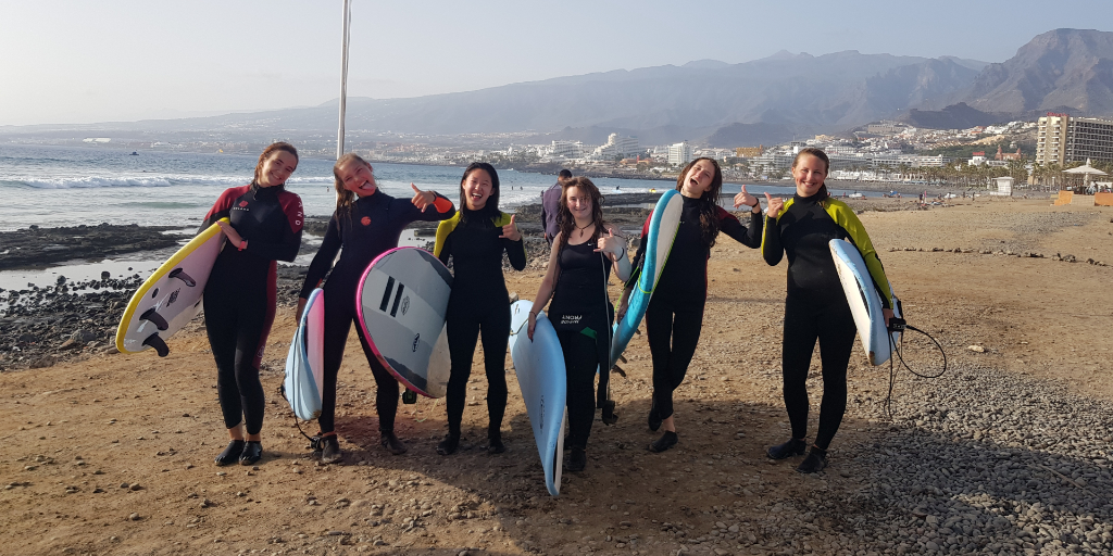 Teens surfing in Tenerife